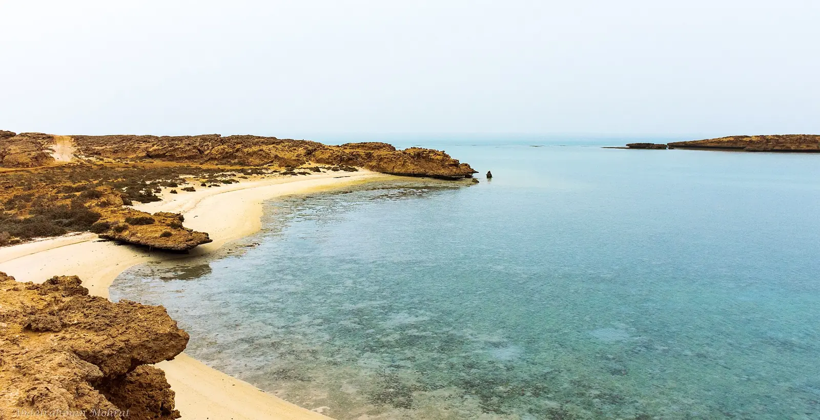 An empty beach and turquoise water on a Farasan Islands beach